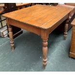 A pine kitchen table, with single end drawer, on turned legs, 106x90x75cm