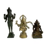 Three cast metal figures of ganesha, the tallest 26cmH