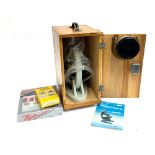 A Chinese made microscope in fitted pine box, with slide kit