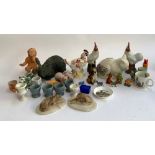 A mixed lot of ceramic animal figurines, to include a pair of alabaster hound dogs; Goebel