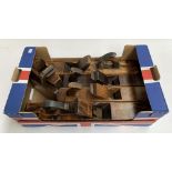 A box of six vintage wooden planes, including Marples & Co.