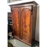 A late Victorian gents mahogany compactum wardrobe, two doors, 133x56x209cmH