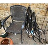 A pair of stacking metal garden armchairs; together with three folding metal garden chairs