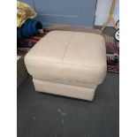 A faux leather pouffe, 60x60x43cm