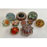 A collection of 10 glass paperweights, to include millefiori and others