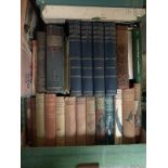 A box of mainly hardback books, to include Robinson Crusoe, Jack Higgins, Robert Louis Stevenson