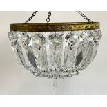 A small cut glass hanging chandelier