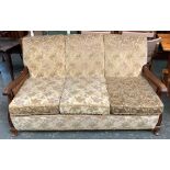 A matching three seater sofa with double caned sides, 156cmW