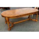 A substantial India Jane oak D-end dining table, approx. 230cmL