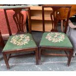 A pair of 19th century vase splat mahogany dining chairs with drop in seats