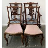 A set of four mahogany dining chairs, one carver, on cabriole legs
