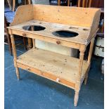 A 19th century pine wash stand, with undershelf and two drawers, 97x50x81cmH, 102cmH to top of