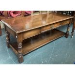 A Reprodux oak coffee table, with single drawer and undershelf, 122x51x47.5cmH