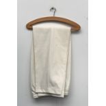 A pair of Gunn & Moore cricket whites, size L