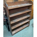 A stained pine bookshelf of five shelves, 90cmW