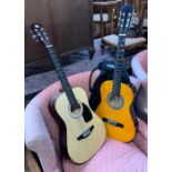 A child's acoustic guitar by Valencia; together with a further child's classical guitar by Encore (