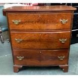 A small mahogany bowfront chest of three drawers on bracket feet, 77x43x83cmH