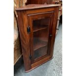 A glazed mahogany corner cupboard, 55cmW