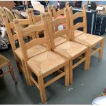 A set of six very solid beechwood chairs with rush seats
