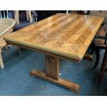 A modern parquetry style extending dining table, approx. 153x95x75cmH, with two spare leaves, each
