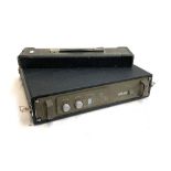 An ICE DPA 600 power amplifier in travel case