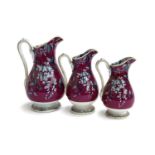 A set of three graduating Staffordshire 'Westeria' pattern jugs, the tallest 25cmH