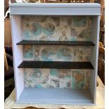 A grey painted bookshelf, the shelves backed with various maps, 72cmW; together with a tile top