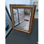 A rectangular wall mirror with burr walnut effect frame, 59x49cm