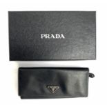 A Prada black long classic Saffiano triangle logo wallet, boxed