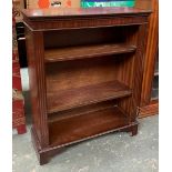 A small stained oak bookshelf, dentil cornice over two adjustable shelves, 77cmW