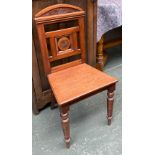 A 19th century hall chair, carved back on turned front legs, approx. 45cmW