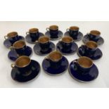A Rostrand coffee set comprising 12 cups and 12 saucers
