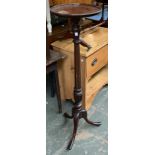 A mahogany torchere, with dish top, 110cmH