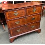 A cross and feather banded chest of two short over two long drawers, on bracket feet, 80x43x76cmH