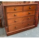 A 19th century mahogany chest of two short over three long drawers, flanked by fluted quarter