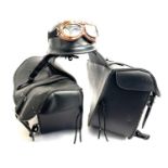 A pair of black leather motorcycle panniers, together with a costume helmet