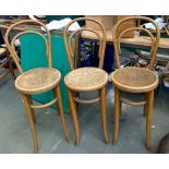 Three thonet style bentwood highchairs, one bearing label for 'Mundus Vienna', each seat approx.