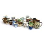 A mixed lot of jugs to include lustre, Torquay, Honiton, Staffordshire, Paragon, Masons, Cornish