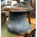 A 19th century taxidermy elephants foot, repurposed as a side table with octagonal top, 41cmH