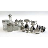A small lot of silver and plated items to include two small silver twin handled trophy cups, small