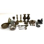 A mixed lot of metals items to include brass candlesticks, vases, miniature pewter cup and plate,