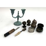 A mixed lot to include a six piece white metal chased cruet set; small two arm candlestick etc
