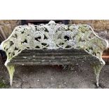 A painted cast iron garden bench, with slatted seat, 152cmW