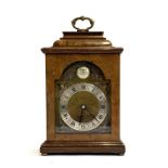 A Beards of Cheltenham walnut veneer mantel clock, 30cmH