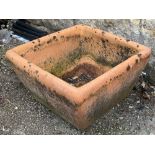 A square terracotta garden planter, 40x40x24cm