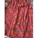 A pair of lined red curtains, 230cm drop 260cm wide