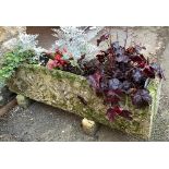 A large composite stone trough planter, raised on stone supports, 106x25x27cmH