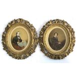 A pair of early 19th century portraits of a lady and gent, three-quarter length seated,