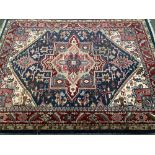 A large Axminster rug, 250x340cm