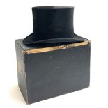 A silk top hat by Henry Heath ltd. Oxford Street London, front to back 7 5/8, side to side 6 1/8, in